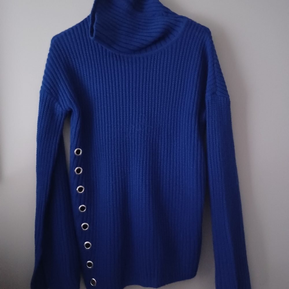 A blue turtleneck sweater